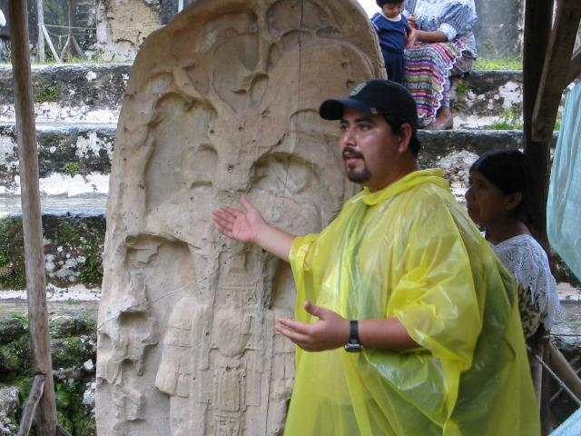 Cesar explaining the carvings