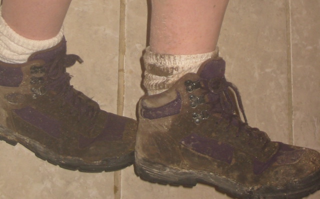 Muddy shoes from hiking in the rain
